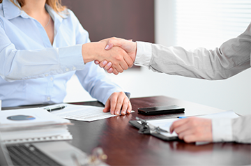 Two people shaking hands